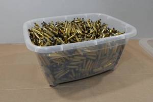 lot 122 image: Bin of Empty .223 Rem Casings