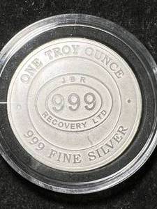 lot 08 image: 1 TROY OZ .999 FINE SILVER JBR ROUND IN AIRTITE