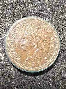 lot 34 image: 1886 US INDIAN HEAD CENT AU IN AIRTITE