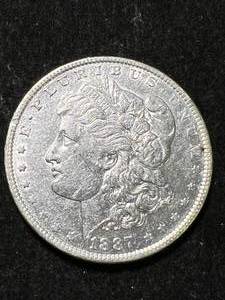 lot 46 image: 1887 US MORGAN SILVER DOLLAR