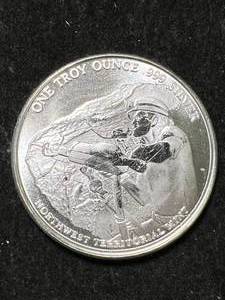 lot 53 image: 1 TROY OZ .999 FINE SILVER NW TERRITORIAL MINT ROUND