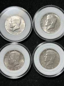 lot 56 image: GROUP OF 4 US 1965 KENNEDY HALF DOLLARS IN AIRTITES