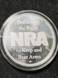lot 79 image: 1 TROY OZ .999 FINE SILVER NRA ROUND IN AIRTITE
