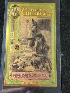 lot 87 image: 12000TH TROY OZ 24K GOLD FLORIDA GOLDBACK