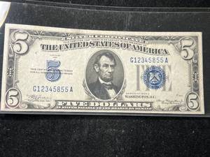 lot 93 image: 1934A US BLUE SEAL $5 SILVER CERTIFICATE
