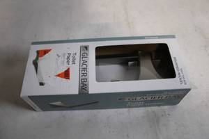 lot 45 image: Glacier Bay Brushed Nickel Toilet Paper Holder - Winstead Collection