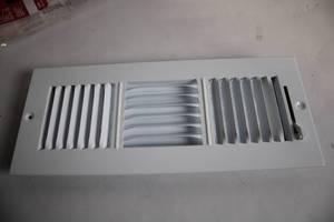 lot 373 image: Everbilt 12 in x 4 in Ceiling & Wall Register - White