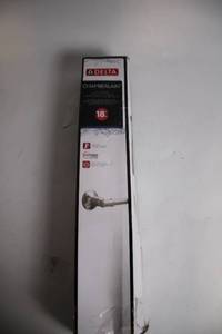 lot 403 image: Unopened Delta Chamberlain 18 Towel Bar in Spotshield Brushed Nickel