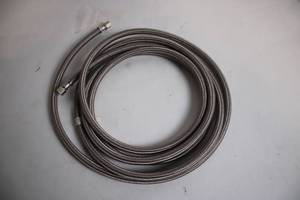 lot 412 image: Heavy Duty Stainless Steel Braided Hose with Connectors