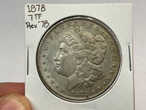 lot 64 image: 1878 7TF Rev79 Morgan Silver Dollar