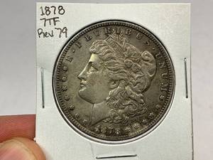 lot 65 image: 1878 7TF Rev79 Morgan Silver Dollar