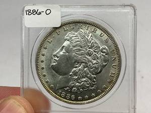 lot 33 image: 1886-O Morgan Silver Dollar