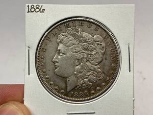 lot 34 image: 1886 Morgan Silver Dollar