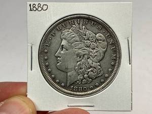 lot 57 image: 1880 Morgan Silver Dollar