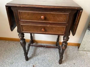 lot 24 image: End Table with Wings on Side