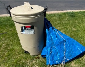 lot 151 image: Rubbermaid Trashcan & Large Blue Tarp