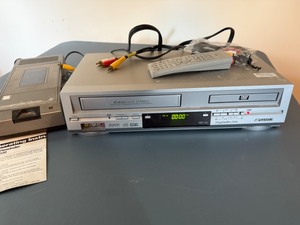 lot 117 image: Sansui VCR & DVD Player Plus VHS Tape Rewinder