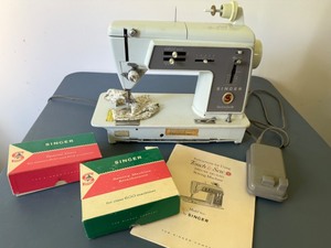 lot 112 image: Singer Touch N Sew Sewing Machine with Book & Accessories