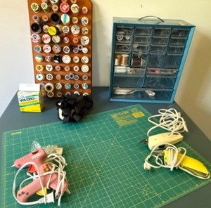 lot 113 image: Sewing Fun Olfa Mat, Thread and Organizer, Electric Clippers, Velcro and Glue Guns