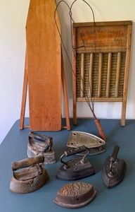 lot 132 image: Laundry Collection from the Past with Cute Childs Size Ironing Board, Collection of Irons, Washboard & Rug Beater