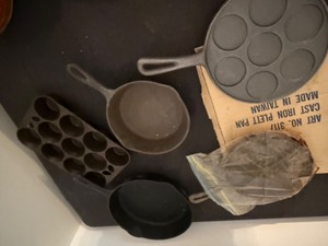 lot 214 image: Cast Iron that Includes Griswold Muffin Pan From Erie, PA, Plett Pan, Several Fry Pans