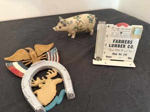 lot 99A image: Vintage Cast Iron Patriotic Painted Wall Decorated, 1905 Cast Iron Advertising Pig Bank and Farmers Lumber Co Rain Gauge