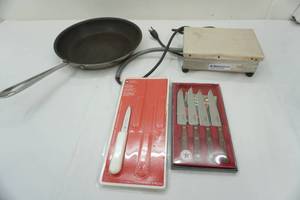 lot 21 image: Small Housewares lot knives, pan, heat plate
