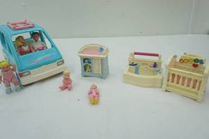 lot 64 image: Fisher Price Dolls and Accessories