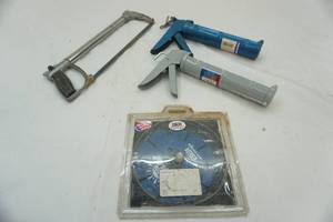 lot 126 image: caulking guns, hacksaw & blue concrete blade