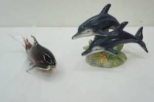 lot 142 image: dolphin figurines