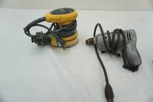 lot 194 image: DeWalt hand sander & power drill