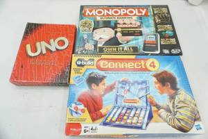 lot 259 image: Game Lot connect 4, Monopoly, UNO Deluxe