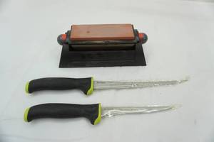 lot 302 image: 9 & 8 filet knife and sharpener