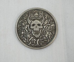 lot 424 image: Demon Skull Hobo Coin. U.S. One Dollar