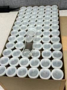 lot 21 image: 72 - Mercer Glass Shell Vials With Polyethylene Closures Twelve Dram - 29 x 94mm