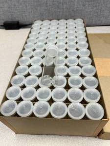 lot 23 image: 72 - Mercer Glass Shell Vials With Polyethylene Closures Twelve Dram - 29 x 94mm