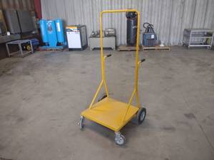 lot 47 image: Yellow Push Cart, 25.5x24 Base...