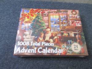lot 24 image: 1008 pc Advent Calendar Puzzle (24-...