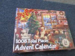 lot 26 image: 1008 pc Advent Calendar Puzzle (24-...