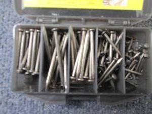 lot 78 image: 4- 150ct Steel Nails...