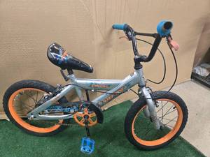 lot 6 image: 14 Huffy Mountain Bike ( USED)