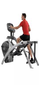 lot 13 image: Cybex Arc Trainer Commercial Elliptical 525AT ( Like New, barely Used). Sold online for over $4000 Used.