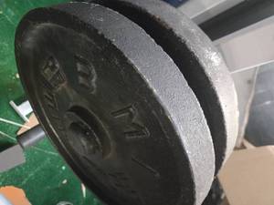 lot 23 image: A Pair of 35LB  2-inch BMI Weight Plates (USED)