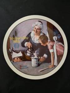 lot 25 image: The Cooking Lesson  Artist Norman Rockwell.  COA Included.  Size 8 12