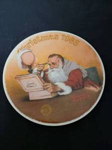 lot 31 image: Grandpa Plays Santa -  Artist Norman Rockwell.  COA Included. Size 8 14