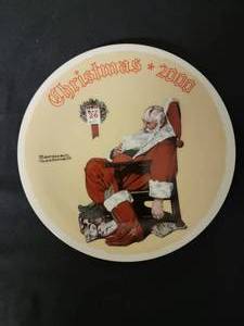 lot 49 image: The Day After Christmas -  Artist Norman Rockwell.  COA Included.  Size 6 14