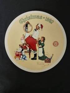lot 141 image: The Christmas Surprise - Artist Norman Rockwell.  COA Included.  Size 8 14