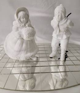 lot 9 image: Cheryl Johnson - Vintage Dept 56 Matte Finish Victorian Ice Skaters - Boy and Girl on Sheet of Ice (Mirror).  Boy has metal skates