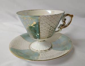 lot 8 image: Enesco Tea Cup and Saucer Set made in Japan