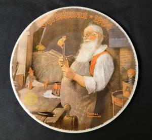 lot 13 image: Santa In His Workshop -   Artist Norman Rockwell.  COA Included. Size 8 14
